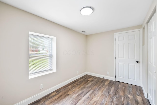 114 N Trine St, Canal Winchester, OH 43110 - unfurnished bedroom featuring dark wood-type flooring