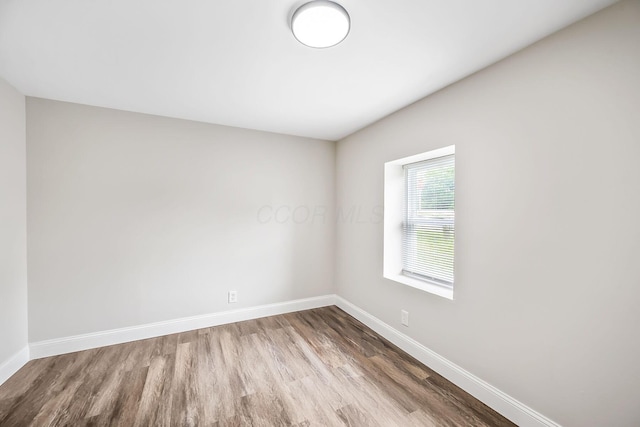 114 N Trine St, Canal Winchester, OH 43110 - unfurnished room with wood finished floors and baseboards