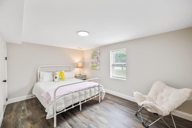 114 N Trine St, Canal Winchester, OH 43110 - bedroom featuring baseboards and wood finished floors