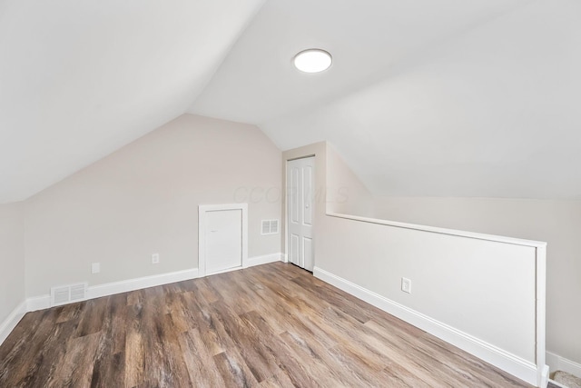 114 N Trine St, Canal Winchester, OH 43110 - additional living space with wood finished floors and vaulted ceiling