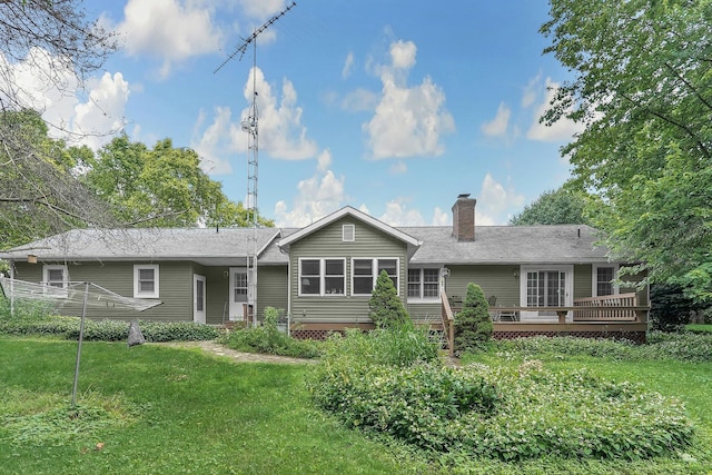 8421 Ransom Rd, Mount Vernon, OH 43050 - back of house with a deck, a chimney, and a lawn