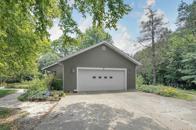 8421 Ransom Rd, Mount Vernon, OH 43050 - view of home's exterior featuring driveway and an attached garage