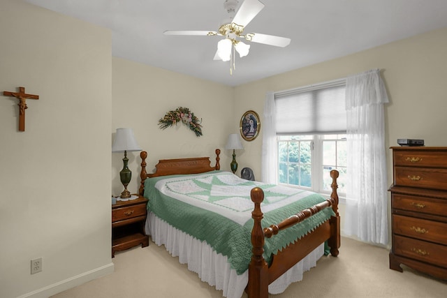8421 Ransom Rd, Mount Vernon, OH 43050 - bedroom with light carpet and a ceiling fan