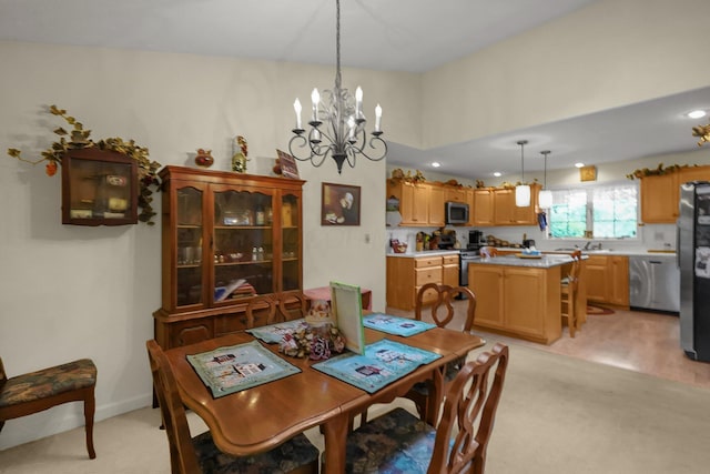8421 Ransom Rd, Mount Vernon, OH 43050 - dining room featuring a chandelier, light colored carpet, and recessed lighting