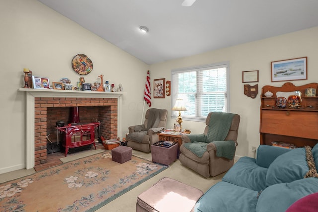 8421 Ransom Rd, Mount Vernon, OH 43050 - living room with a wood stove, carpet, lofted ceiling, and ceiling fan
