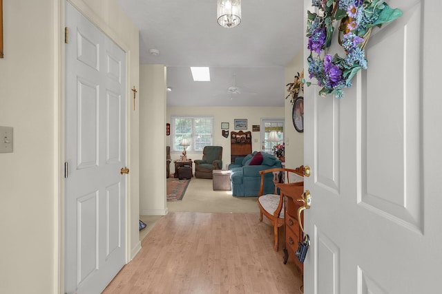8421 Ransom Rd, Mount Vernon, OH 43050 - entrance foyer featuring a skylight, light wood-type flooring, and ceiling fan