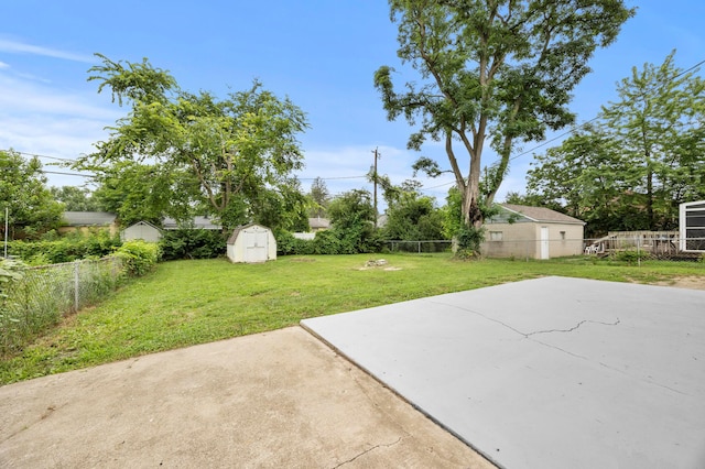 2468 Spaatz Ave, Columbus, OH 43204 - fenced backyard with a storage unit and a patio