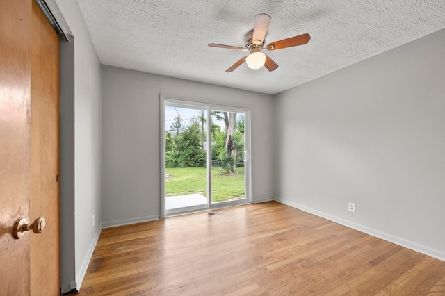 2468 Spaatz Ave, Columbus, OH 43204 - empty room featuring wood finished floors, a textured ceiling, and ceiling fan