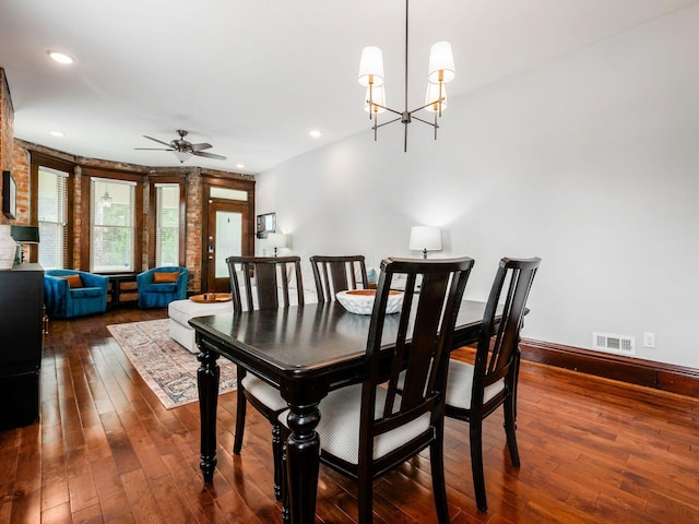 119 Miami Ave Unit 119, Columbus, OH 43203 - dining room with dark wood finished floors, a ceiling fan, a chandelier, and recessed lighting