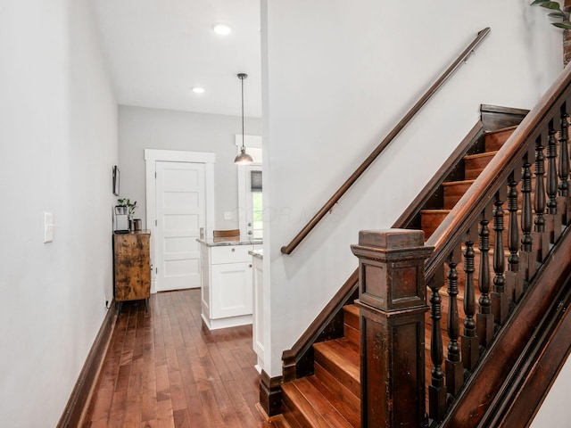 119 Miami Ave Unit 119, Columbus, OH 43203 - stairway featuring hardwood / wood-style flooring and recessed lighting