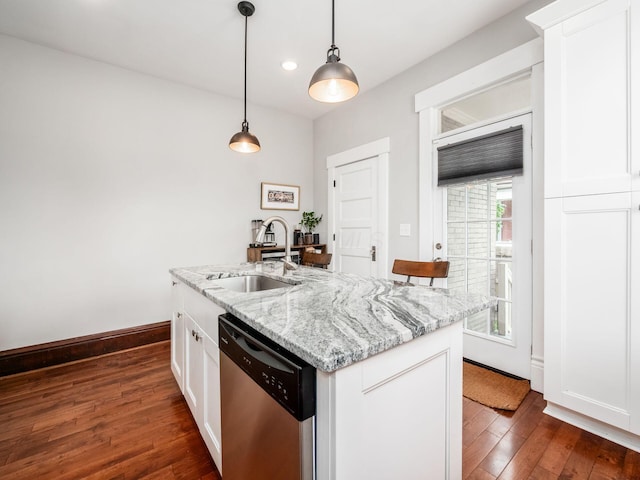 119 Miami Ave Unit 119, Columbus, OH 43203 - kitchen featuring dishwasher, dark wood-style flooring, hanging light fixtures, white cabinets, and light stone countertops
