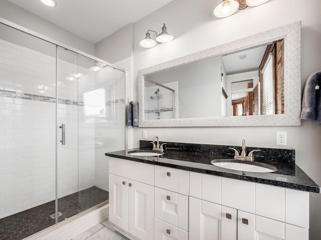 119 Miami Ave Unit 119, Columbus, OH 43203 - bathroom with a stall shower and double vanity
