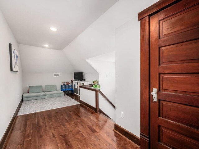 119 Miami Ave Unit 119, Columbus, OH 43203 - bedroom featuring wood finished floors, vaulted ceiling, and recessed lighting