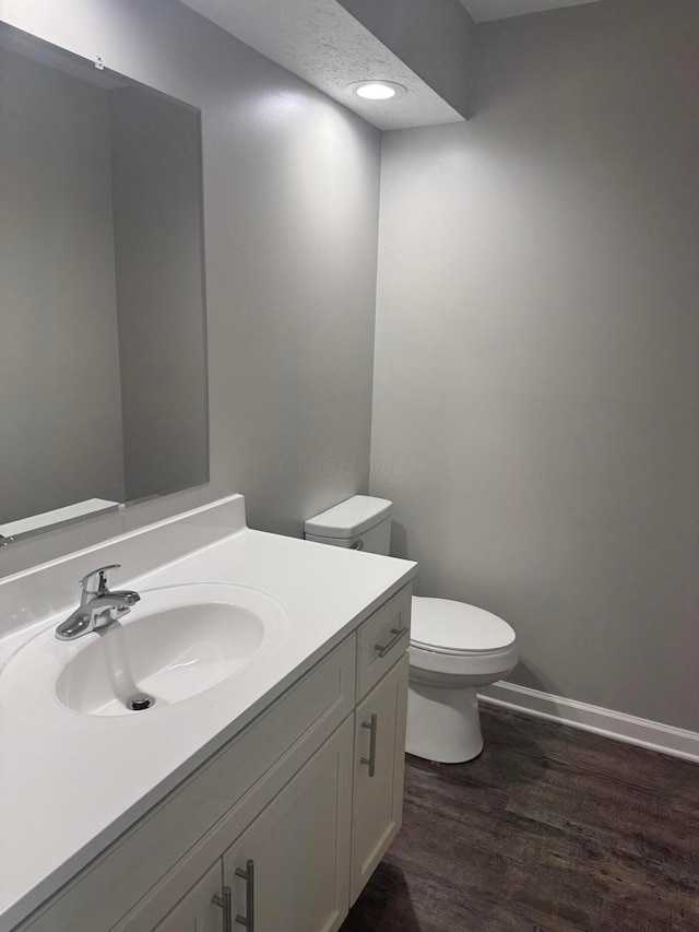 7771 Deercrest Ct, Dublin, OH 43016 - bathroom featuring vanity and wood finished floors