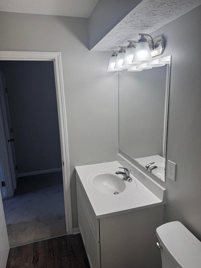 7771 Deercrest Ct, Dublin, OH 43016 - bathroom featuring vanity and wood finished floors