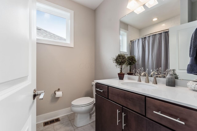 1232 N Grant Ave, Columbus, OH 43201 - full bathroom featuring vanity, tile patterned flooring, and curtained shower