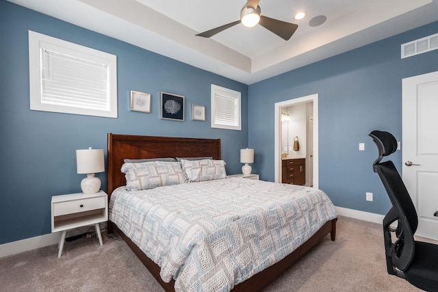 1232 N Grant Ave, Columbus, OH 43201 - bedroom featuring carpet flooring, a raised ceiling, ensuite bathroom, and a ceiling fan