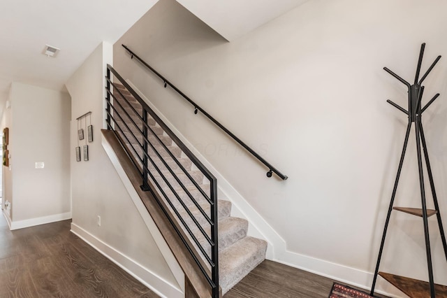 1232 N Grant Ave, Columbus, OH 43201 - stairway featuring wood finished floors and baseboards