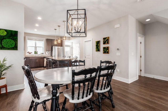 1232 N Grant Ave, Columbus, OH 43201 - dining room with dark wood-style flooring, recessed lighting, and a chandelier