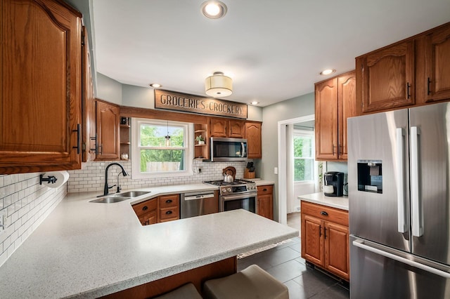 2566 Mcdaniel Ct, Grove City, OH 43123 - kitchen with stainless steel appliances, open shelves, healthy amount of natural light, light countertops, and recessed lighting