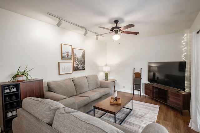 2566 Mcdaniel Ct, Grove City, OH 43123 - living room featuring rail lighting, ceiling fan, and wood finished floors
