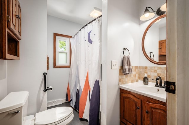 2566 Mcdaniel Ct, Grove City, OH 43123 - full bathroom with vanity, decorative backsplash, and curtained shower