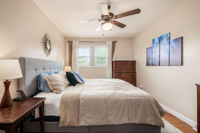 2566 Mcdaniel Ct, Grove City, OH 43123 - bedroom with wood finished floors and a ceiling fan