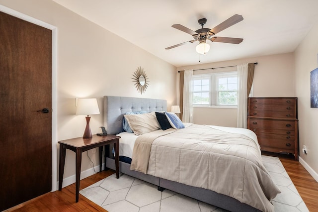 2566 Mcdaniel Ct, Grove City, OH 43123 - bedroom featuring wood finished floors and a ceiling fan