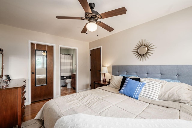 2566 Mcdaniel Ct, Grove City, OH 43123 - bedroom with wood finished floors, ensuite bath, and ceiling fan