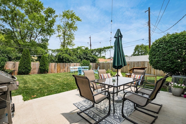 2566 Mcdaniel Ct, Grove City, OH 43123 - fenced backyard featuring outdoor dining space, a patio area, and a grill