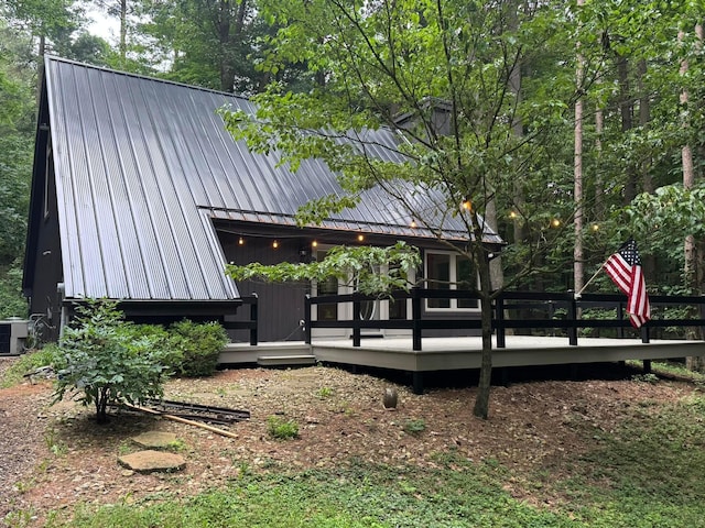 633 Kingsview Dr, Howard, OH 43028 - rear view of property with a metal roof and a wooden deck