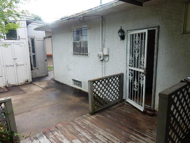 1549 Alpine Dr, Columbus, OH 43229 - wooden deck with a patio area
