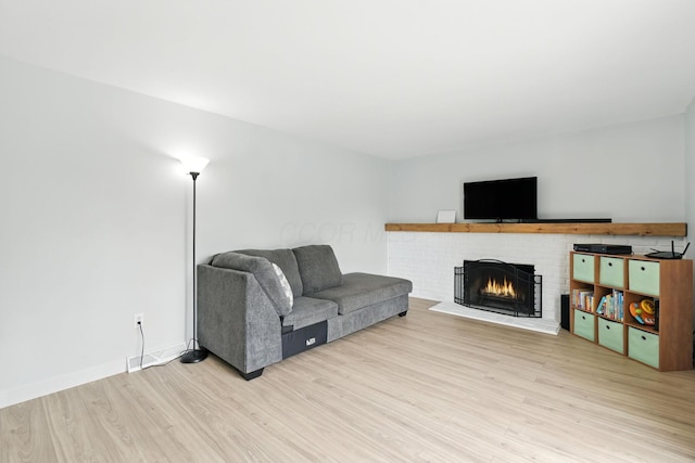 2036 Queensbridge Dr, Columbus, OH 43235 - living area featuring wood finished floors and a fireplace