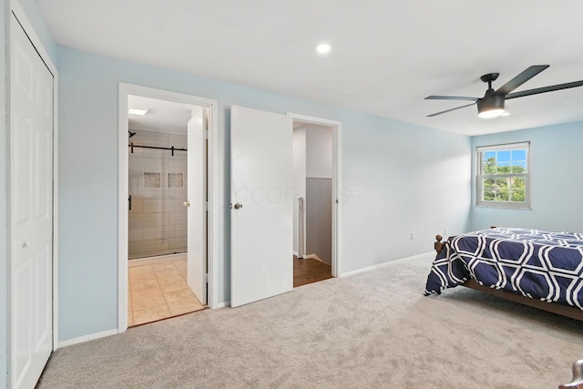 2036 Queensbridge Dr, Columbus, OH 43235 - bedroom with carpet floors, a ceiling fan, and connected bathroom