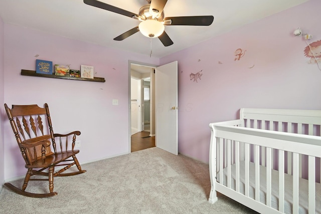 2036 Queensbridge Dr, Columbus, OH 43235 - bedroom with carpet floors, a ceiling fan, and a nursery area