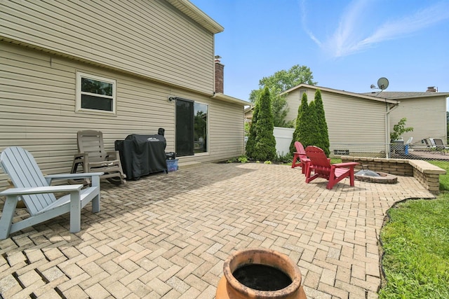 2036 Queensbridge Dr, Columbus, OH 43235 - view of patio / terrace featuring an outdoor fire pit and area for grilling