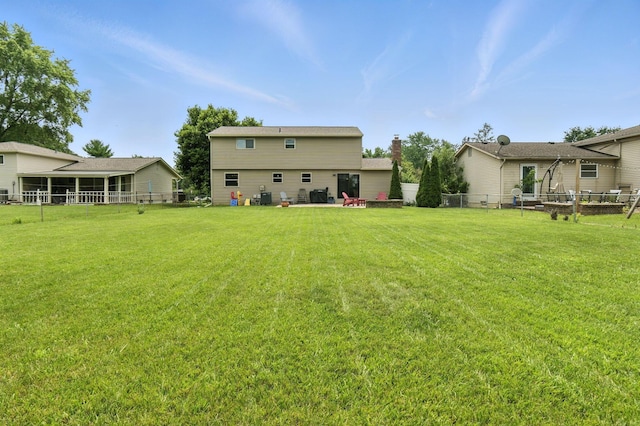 2036 Queensbridge Dr, Columbus, OH 43235 - rear view of property with a fenced backyard and a patio area