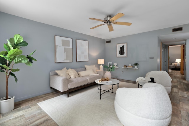 1481 Cliff Ct Unit 58-A, Columbus, OH 43204 - living room with wood finished floors and ceiling fan