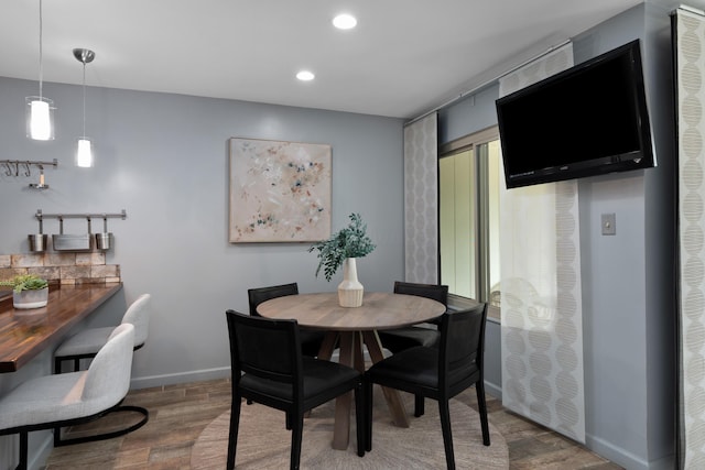 1481 Cliff Ct Unit 58-A, Columbus, OH 43204 - dining room featuring wood finished floors and recessed lighting