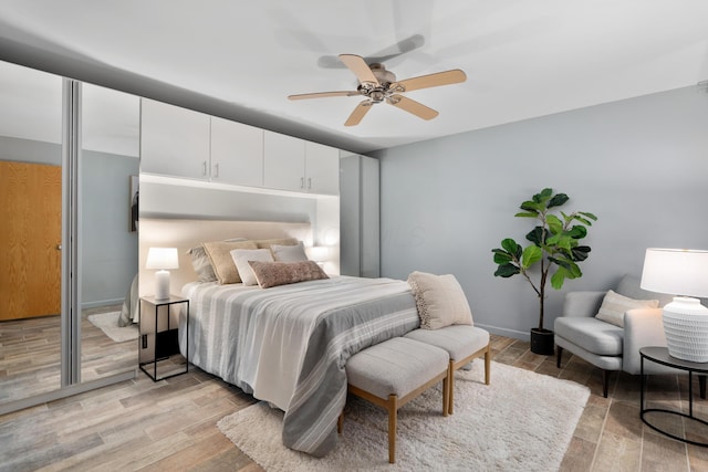 1481 Cliff Ct Unit 58-A, Columbus, OH 43204 - bedroom with light wood-style flooring and a ceiling fan