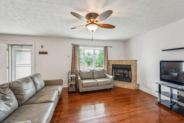 9900 Waterloo Eastern Rd, Canal Winchester, OH 43110 - living area with plenty of natural light, wood-type flooring, a ceiling fan, and a textured ceiling