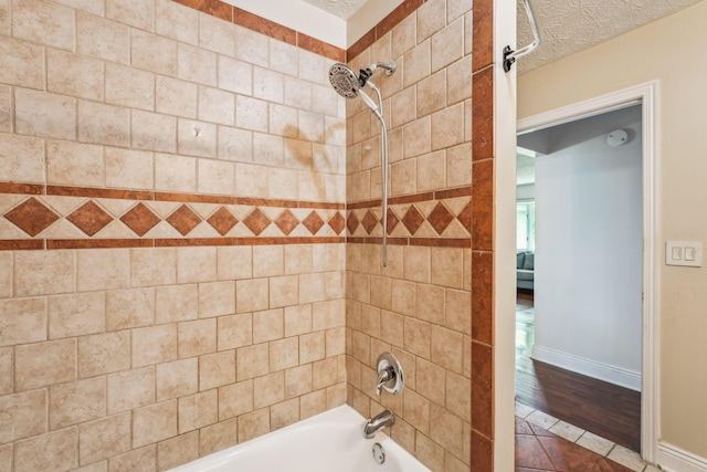 9900 Waterloo Eastern Rd, Canal Winchester, OH 43110 - bathroom with shower / bathtub combination, tile patterned flooring, and a textured ceiling