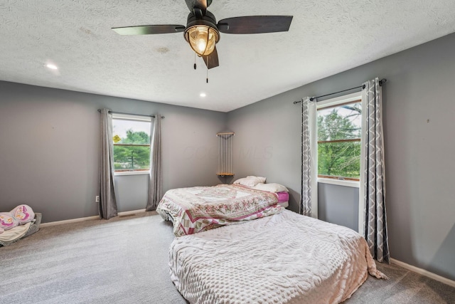 9900 Waterloo Eastern Rd, Canal Winchester, OH 43110 - carpeted bedroom with multiple windows, recessed lighting, ceiling fan, and a textured ceiling