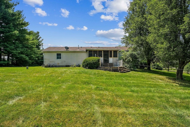 9900 Waterloo Eastern Rd, Canal Winchester, OH 43110 - rear view of property featuring a sunroom and a yard