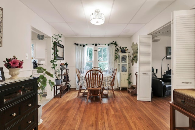 220 Robinwood Ave, Columbus, OH 43213 - dining area featuring light wood-style flooring and a drop ceiling