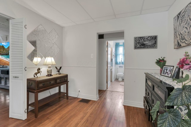 220 Robinwood Ave, Columbus, OH 43213 - hall with a drop ceiling and wood-type flooring
