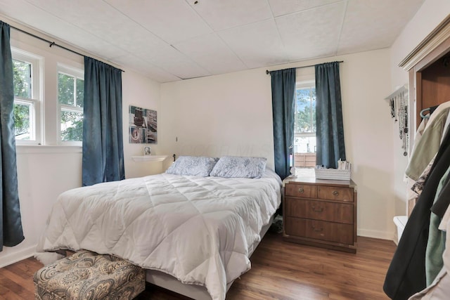 220 Robinwood Ave, Columbus, OH 43213 - bedroom featuring dark wood-type flooring and baseboards