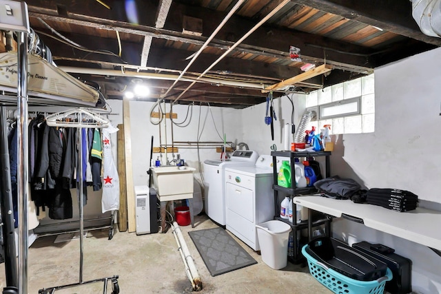 220 Robinwood Ave, Columbus, OH 43213 - below grade area with washing machine and clothes dryer and a sink