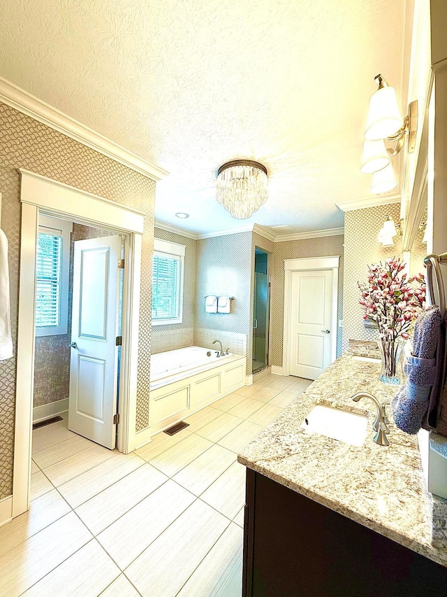 2000 Forestview Ln, Delaware, OH 43015 - bathroom with crown molding, tile patterned flooring, a garden tub, a chandelier, and double vanity
