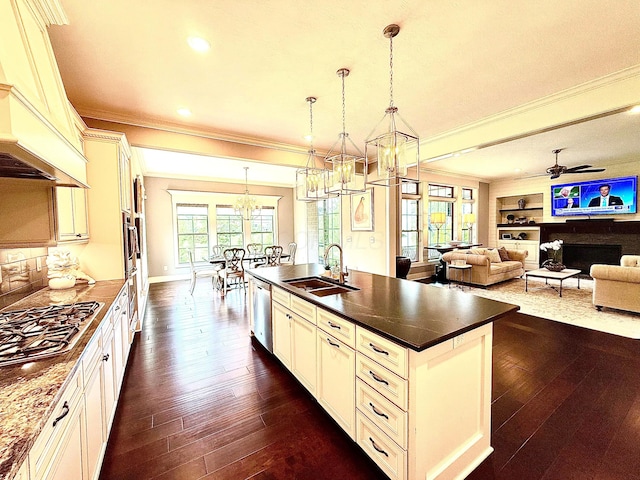 2000 Forestview Ln, Delaware, OH 43015 - kitchen featuring a chandelier, appliances with stainless steel finishes, ornamental molding, dark countertops, and custom exhaust hood